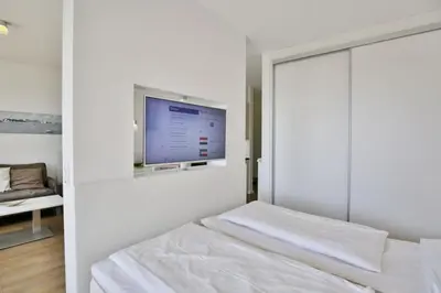 Ein Bett oder Betten in einem Zimmer der Unterkunft Alte Liebe, RA207