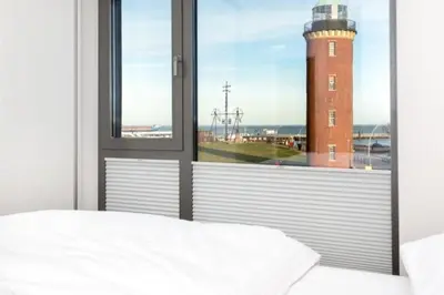 Ein Bett oder Betten in einem Zimmer der Unterkunft Alte Liebe, RA201