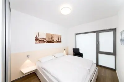 Ein Bett oder Betten in einem Zimmer der Unterkunft Alte Liebe, RA201