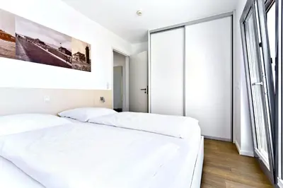 Ein Bett oder Betten in einem Zimmer der Unterkunft Alte Liebe, RA208