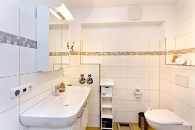 Ein Badezimmer in der Unterkunft Rugenbarg, RR6