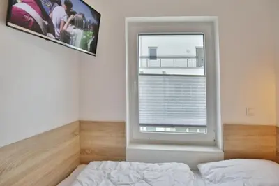 Ein Bett oder Betten in einem Zimmer der Unterkunft Admiralsgarten, AG10b