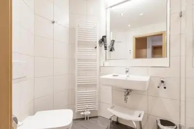 Ein Badezimmer in der Unterkunft Admiralsgarten, AG10b