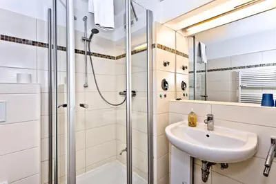 Ein Badezimmer in der Unterkunft Hohe Worth, H412