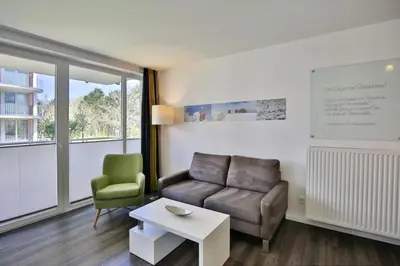 Ein Sitzbereich in der Unterkunft Duhner Strandhus, S104