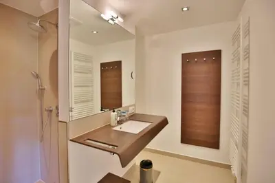 Ein Badezimmer in der Unterkunft Duhner Strandhus, S104