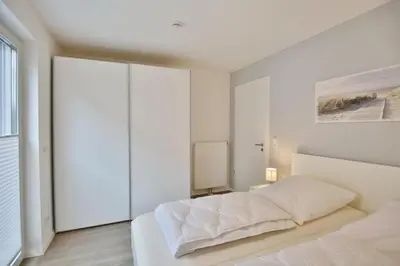 Ein Bett oder Betten in einem Zimmer der Unterkunft Meine See, MS2