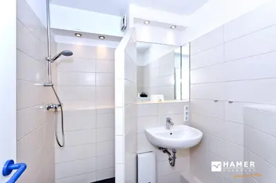 Ein Badezimmer in der Unterkunft Hohe Worth, H405