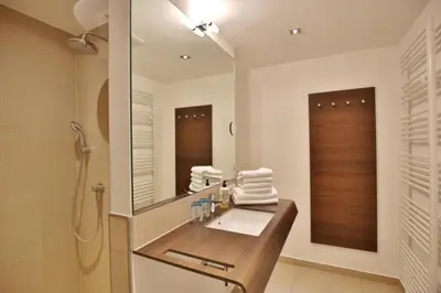 Ein Badezimmer in der Unterkunft Duhner Strandhus, S112