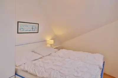 Ein Bett oder Betten in einem Zimmer der Unterkunft Seemöwe, SM12