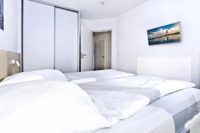 Ein Bett oder Betten in einem Zimmer der Unterkunft Alte Liebe, RA305