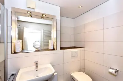 Ein Badezimmer in der Unterkunft Hohe Worth, H311