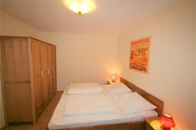 Ein Bett oder Betten in einem Zimmer der Unterkunft Stranddüne, D19