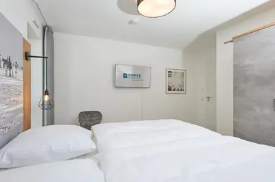 Ein Bett oder Betten in einem Zimmer der Unterkunft Nordstrand, N102a