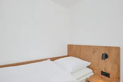 Ein Bett oder Betten in einem Zimmer der Unterkunft Nordstrand, N102a