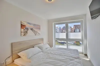 Ein Bett oder Betten in einem Zimmer der Unterkunft City Marina, CM24d