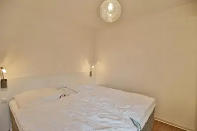 Ein Bett oder Betten in einem Zimmer der Unterkunft Grooten Steen, GS5