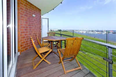 Ein Balkon oder eine Terrasse in der Unterkunft Residenz am Yachthafen, RY17