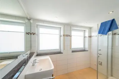 Ein Badezimmer in der Unterkunft Wattwagen, RW6
