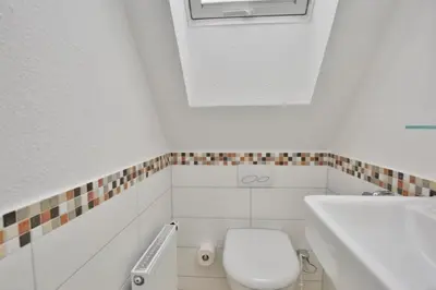Ein Badezimmer in der Unterkunft Wattwagen, RW6