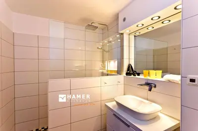 Ein Badezimmer in der Unterkunft Hohe Worth, H205