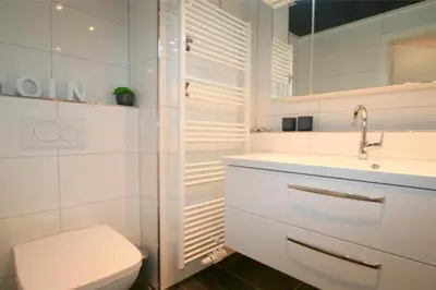 Ein Badezimmer in der Unterkunft Admiralsgarten, AG8b