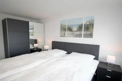 Ein Bett oder Betten in einem Zimmer der Unterkunft Admiralsgarten, AG8b