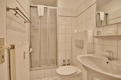 Ein Badezimmer in der Unterkunft Stranddüne, D1