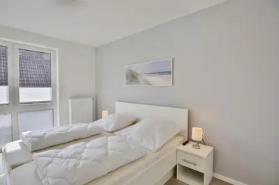 Ein Bett oder Betten in einem Zimmer der Unterkunft Meine See, MS8