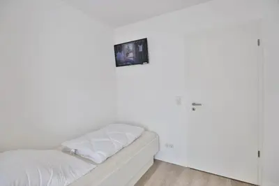 Ein Bett oder Betten in einem Zimmer der Unterkunft Meine See, MS8