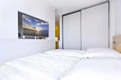 Ein Bett oder Betten in einem Zimmer der Unterkunft Alte Liebe, RA111