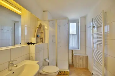 Ein Badezimmer in der Unterkunft Hohe Worth, H302