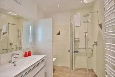 Ein Badezimmer in der Unterkunft Admiralsgarten, AG17b