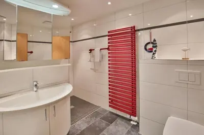 Ein Badezimmer in der Unterkunft Am Seedeich 14, AS6