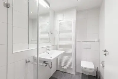 Ein Badezimmer in der Unterkunft Admiralsgarten, AG5s