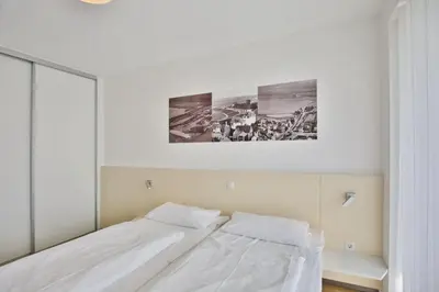 Ein Bett oder Betten in einem Zimmer der Unterkunft Alte Liebe, RA103