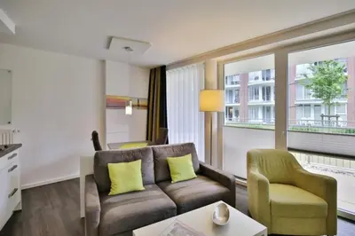 Ein Sitzbereich in der Unterkunft Duhner Strandhus, S6