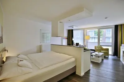 Ein Bett oder Betten in einem Zimmer der Unterkunft Duhner Strandhus, S6