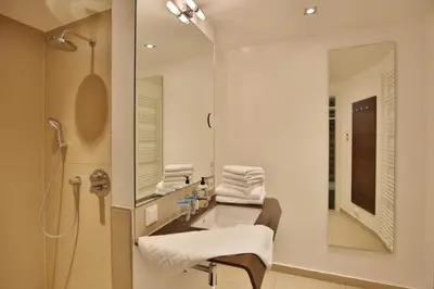 Ein Badezimmer in der Unterkunft Duhner Strandhus, S6
