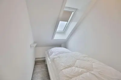 Ein Bett oder Betten in einem Zimmer der Unterkunft Hohe Worth, H407