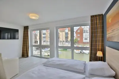 Ein Bett oder Betten in einem Zimmer der Unterkunft City Marina, CM20a