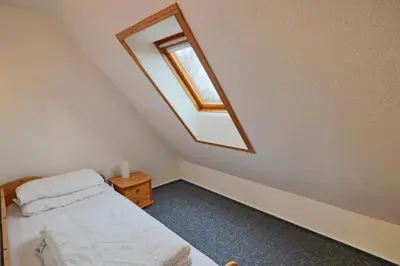 Ein Bett oder Betten in einem Zimmer der Unterkunft Stranddüne, D16