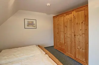 Ein Bett oder Betten in einem Zimmer der Unterkunft Stranddüne, D16