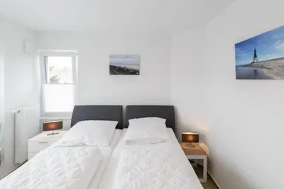 Ein Bett oder Betten in einem Zimmer der Unterkunft Admiralsgarten, AG1b