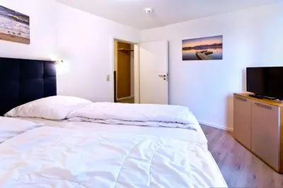Ein Bett oder Betten in einem Zimmer der Unterkunft Seemöwe, SM3