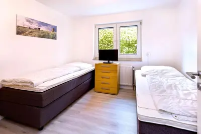Ein Bett oder Betten in einem Zimmer der Unterkunft Seemöwe, SM3