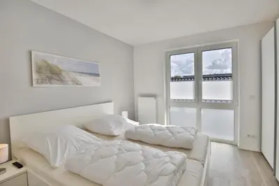Ein Bett oder Betten in einem Zimmer der Unterkunft Meine See, MS9
