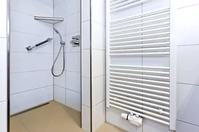 Ein Badezimmer in der Unterkunft Alte Liebe, RA203