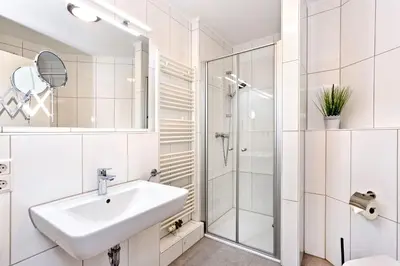 Ein Badezimmer in der Unterkunft Strandpalais, SP405