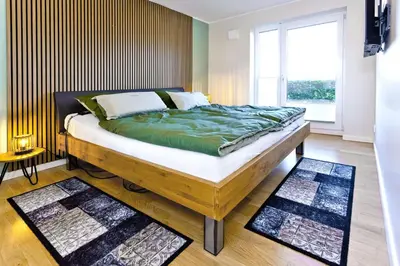 Ein Bett oder Betten in einem Zimmer der Unterkunft Kapitän Alexander, KA44